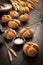 Homemade spelt bread rolls with salt on wooden background