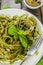Homemade spinach pasta with pesto