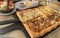 Homemade square pizza with cheese on wooden table Square pizza - Four seasons - Organic pizza - healthy pizza