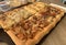 Homemade square pizza with cheese on wooden table Square pizza - Four seasons - Organic pizza - healthy pizza