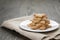 Homemade star shape ginger cookies on wood table