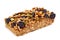 Homemade superfood breakfast bar with oats and blueberries isolated on white