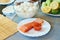 Homemade sushi rolls preparation. Traditional ingredients products foodstuff on the home kitchen table ready to be