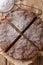 Homemade Swedish chocolate sticky cake close-up on a table. Vert