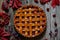 Homemade sweet raspberry pie on vintage wooden table background. Rustic style. Autumn composition.