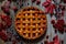 Homemade sweet raspberry pie on vintage wooden table background. Rustic style autumn composition decoration.