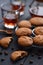 Homemade sweets. Oatmeal cookies served with drip coffee on dark background
