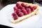 Homemade tart with raspberries