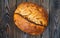 Homemade tartine bread on dark wooden table