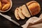 Homemade tartine bread on dark wooden table