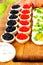 Homemade tartlets with red and black caviar, salmon, lettuce and
