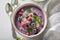 Homemade and tasty cream soup with mint and frozen berries