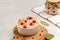 Homemade tasty fermented milk products on a plate sauerkraut with cranberries on a white background, copy space