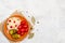 Homemade tasty fermented products on a plate - sauerkraut, tomatoes, pickles, peppercorns, bay leaf on a white background, copy