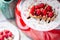 Homemade Toasts with Goat Cheese, Raspberries, Balsamic Cream and Pine Nuts