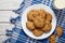 Homemade traditional oatmeal cookies with raisins and chocolate