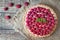 Homemade traditional sweet raspberry tart pie with