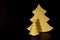 Homemade tree for Christmas or country decoration. Decorative wooden tree. Minimalistic background with fir-trees. New