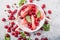 Homemade Vegan Cherry Popsicles in bowl with Coconut Milk, basil. Summer food concept top view