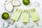 Homemade vegan frozen coconut mojito popsicles - ice pops - paletas with chia seeds.