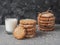 Homemade Vegan Tahini Cookies in stack with glass of milk