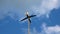 A homemade weather vane turns and shows the strength and direction of the wind.