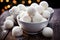 Homemade white cakes on plate with on festive wooden table with bokeh background.