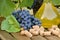 Homemade white and red wine from grapes. Decanters, bottles, corks and grapes photographed against the background of the