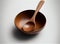 homemade wooden spoon and wooden plate on a white background.