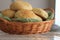 Homemade yeast bread rolls in a basket