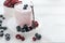 Homemade yogurt with berries in a glass. blueberries and cranberry