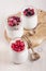 Homemade yogurt with berries in three banks