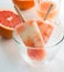 Homemade yogurt ice pops with fresh grapefruit juice