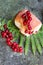 Homemade yummy yeast buns with red currants on a fern leaf