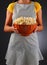 Homemaker Holding a Bowl of Popcorn