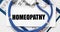 HOMEOPATHY word concept on doctor medical workplace, alternative medicine, top view