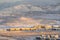 Homes apartments and townhouses with view of mountain on a winter landscape