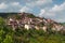 Homes on the cliff among the mountain scenery. Balkan houses