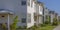 Homes with lawns in Daybreak Utah on a sunny day