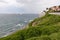 Homes on ocean cliff