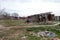 Homes in poor neighborhood where poor people live. Destruction of old houses, earthquakes, economic crisis, abandoned houses.