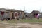 Homes in poor neighborhood where poor people live. Destruction of old houses, earthquakes, economic crisis, abandoned houses.