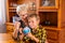 Homeschooling grandmother teaching smart boy, child in geography