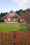 Homestead house with a large yard and garden.