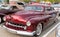 Homestead, Pennsylvania, USA July 21, 2021 A 1951 maroon Mercury Custom coupe