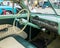 Homestead, Pennsylvania, USA July 21, 2021 The steering wheel, dashboard green interior of a vintage car