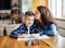 homework teaching boy portrait education mother children son familiy childhood