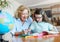 homework teaching education grandmother children granddaughter familiy childhood child teacher classroom senior color