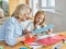 homework teaching education grandmother children granddaughter familiy childhood child teacher classroom senior scissor