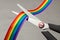 Homophobia. STOP LGBT. Prohibition of demonstrations and same-sex marriage. The LGBT rainbow ribbon tape is cut with